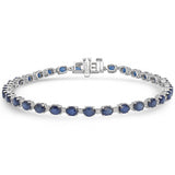 <span style="color:purple">¡ESPECIAL!</span> Pulsera de tenis de oro blanco de 14kt con diamante y zafiro azul de 6.92ct G SI de 7" de largo