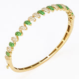 1.21ct G SI 14kt Yellow Gold Diamond & Emerald Spiral Design Bangle Bracelet