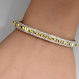 <span style="color:purple">¡ESPECIAL!</span> Brazalete de oro amarillo de 14K con diamantes de 1.05ct G SI