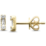 Pendientes de oro amarillo de 14K con diamantes redondos y de baguette de .11qt G SI