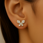 .10ct G SI 14kt Yellow Gold Diamond Butterfly Stud Earrings