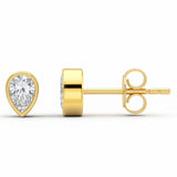 <span style="color:purple">¡ESPECIAL!</span> Aretes de oro amarillo de 14kt con diamantes de talla pera de .32ct G SI y engaste de bisel