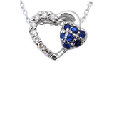 14kt White Gold .12ct Heart Cut Diamond & Blue Sapphire Pendant