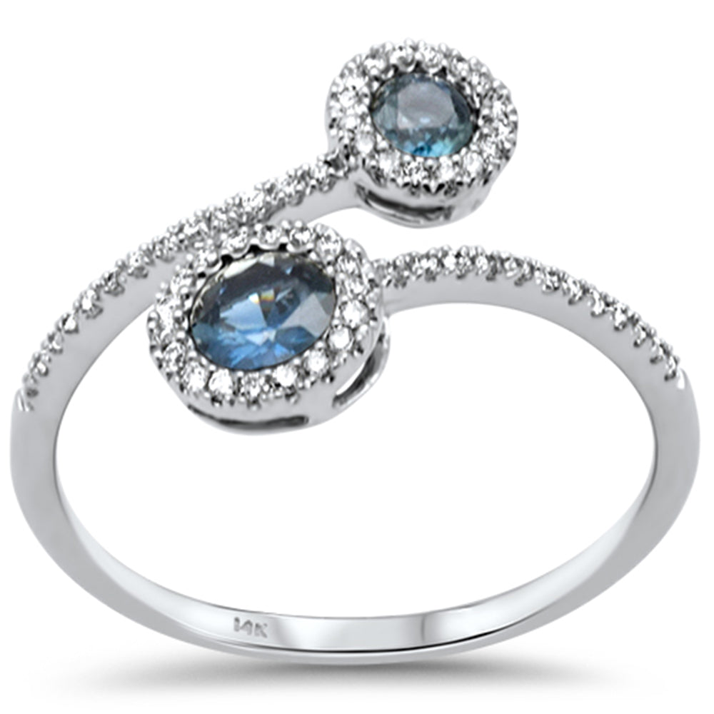 <span style="color:purple">¡ESPECIAL!</span> Anillo .58ct G SI de Oro Blanco de 14K con Diamantes y Zafiros Azules Talla 6.5