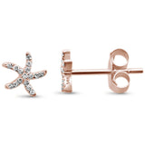 Pendientes de botón de diamante de moda en oro rosa de 14 kt con forma de estrella de mar y 0,06 ct