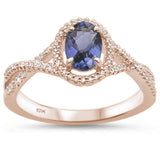<span>GEMSTONE CLOSEOUT! </span> .79ct 10K Rose Gold Natural Tanzanite & Diamond Ring Size 6.5